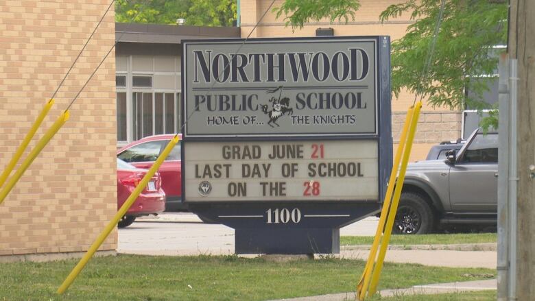 outside of Northwood school, the sign