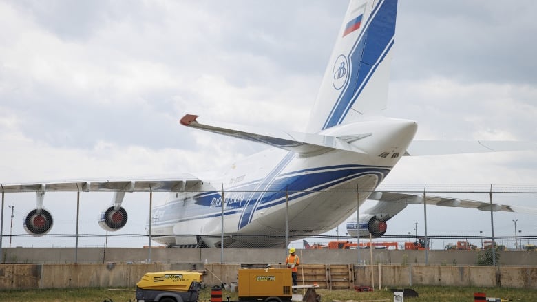 An airplane is pictured parked