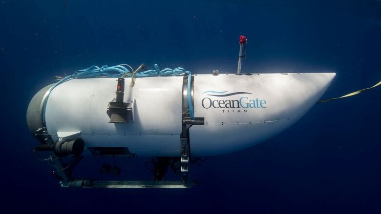 A white vessel under water. 