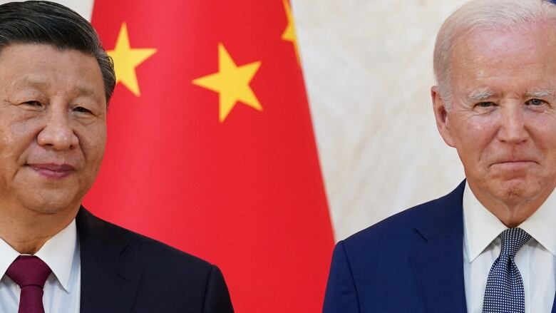 Biden and Xi in front of flag