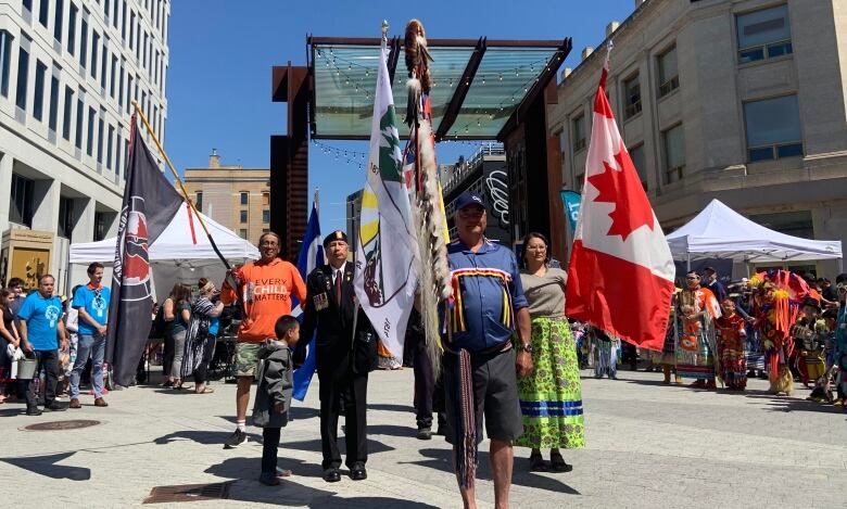 Flags are carried in during a Grand Entry.