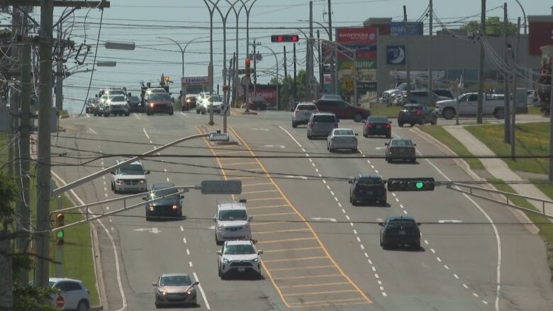 Cars travel on the Malpeque road intersection.