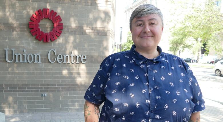 Gina McKay, president of CUPE Manitoba, standing outside the office of CUPE Manitoba. 