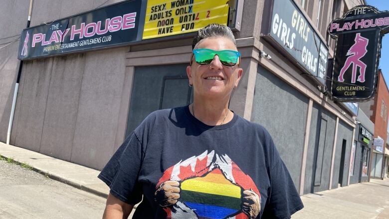 Wendi stands outside of the PlayHouse gentleman's club