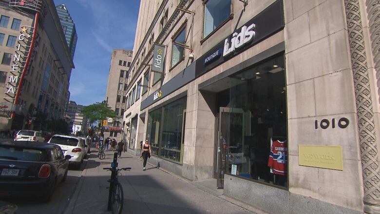 outside shot of Sainte-Catherine street with Lids and Fido storefronts