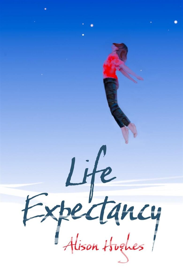 A book cover shows a woman jumping into the air, with her arms behind her. 