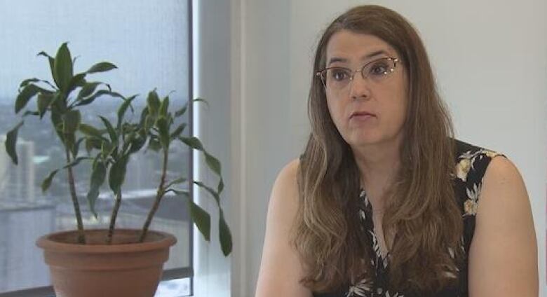 A group board member gives a sit-down interview.