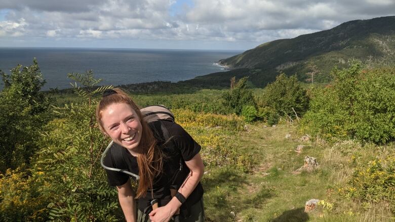 A woman smiling