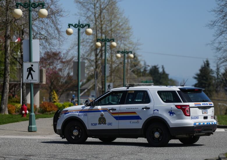 An RCMP car is pictured parked on a residential street. 