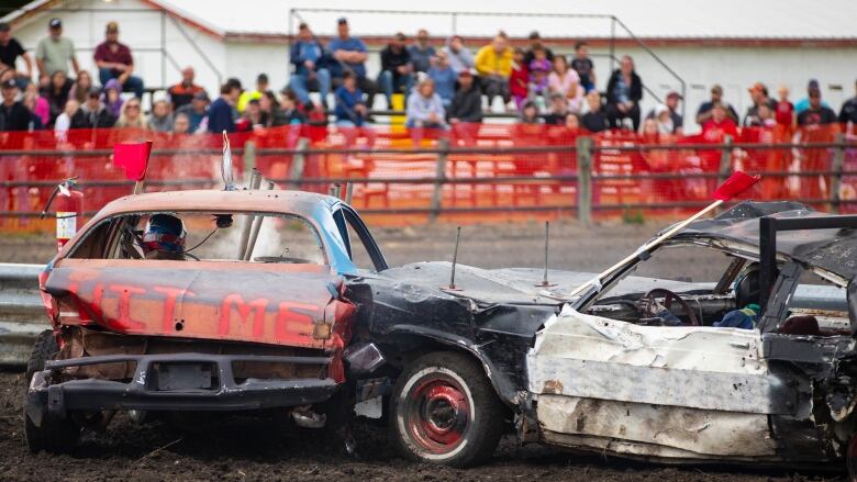 Derby cars crash into each other.