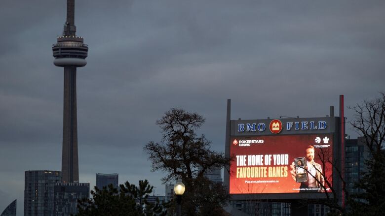 A billboard promoting an online gambling service is seen on a Toronto billboard in November 2022.