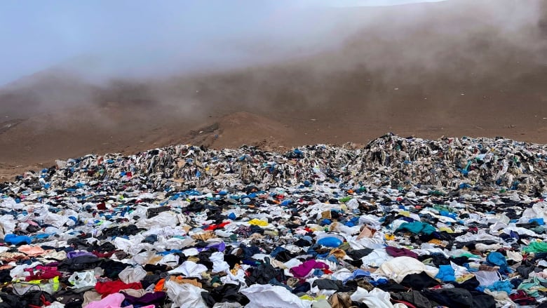 View of used clothes discarded in the Atacama desert, in Alto Hospicio, Iquique, Chile, on September 26, 2021. 