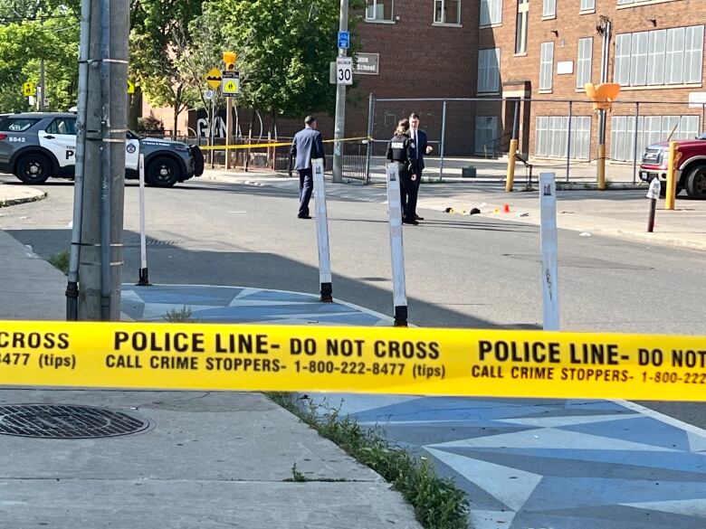 Police at the scene of the shooting in Greektown.