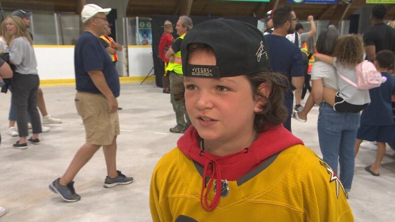 A man in a hockey jersey 