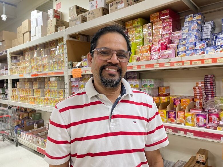 Sriram Ramamurthy, Manager of Iqbal Halal Foods in Toronto, says customers have been stockpiling rice after India moved to ban some exports.