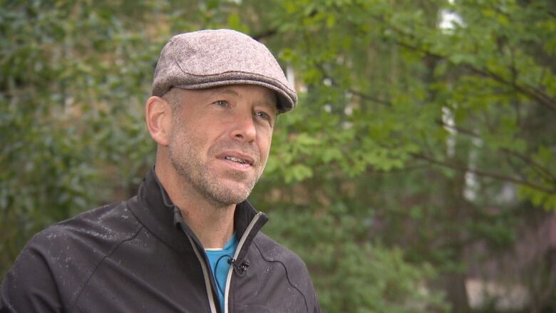 Man in cap speaks to CBC News.