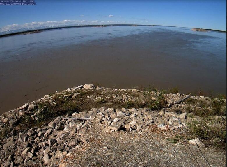 A picture of a lake but there seems to be less water. 