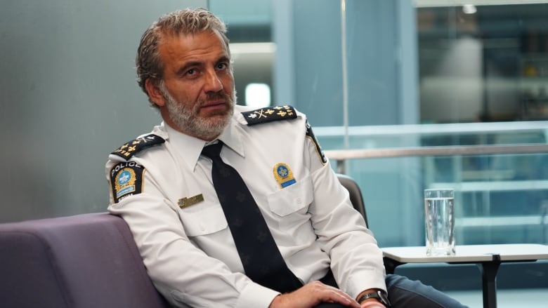 Fady Dagher in his white police uniform at the CBC studio