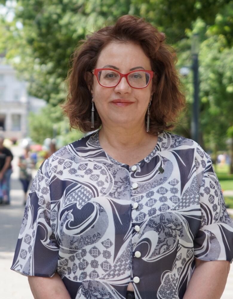 Human rights lawyer Prof. Pearl Eliadis stands near Roddick Gates at McGill University. 