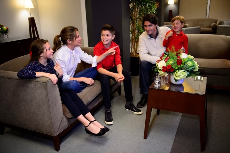 Trudeau, Grgoire Trudeau and children watch election results in Montreal on Monday Oct. 21, 2019.