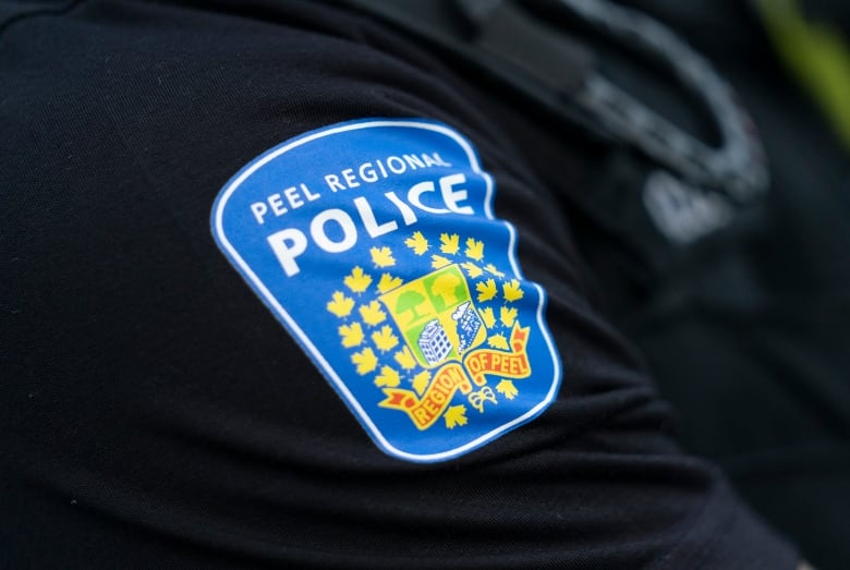 A Peel Regional Police shoulder patch is seen in Mississauga on July 1, 2023.