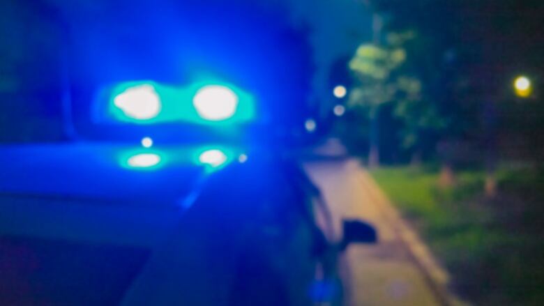 Lights of police car in night time. Night patrolling the city, crime scene. 