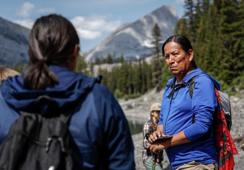 Indigenous Knowledge Keepers Travis Rider speaks with participants in the Rockies Journey camp run by Howl in Kananaskis.