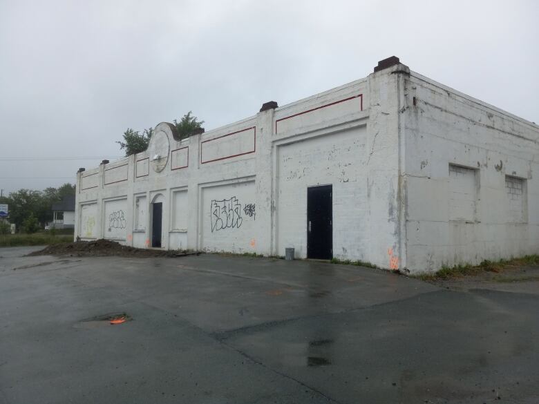 A white concrete building.