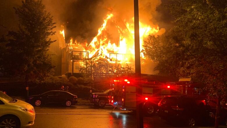 A home is engulfed in flames.