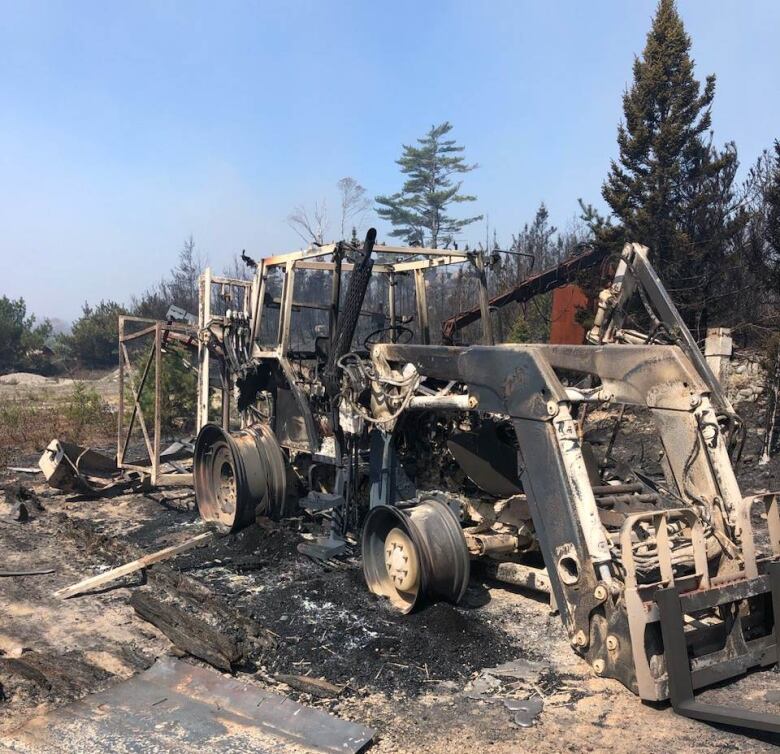 Burnt out farm equipment