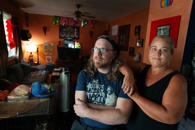 Brenda Reidy, 48, and husband Keith Rousseau, 45, in their east Windsor, Ont. home.