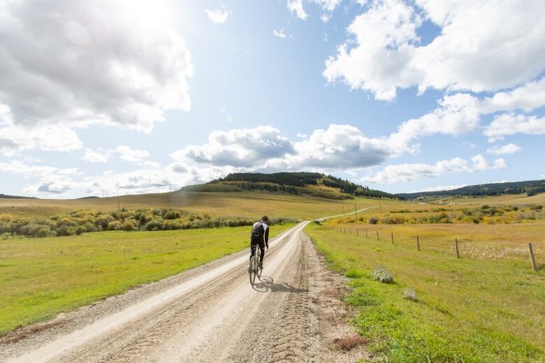 A biker rides on The Range course.