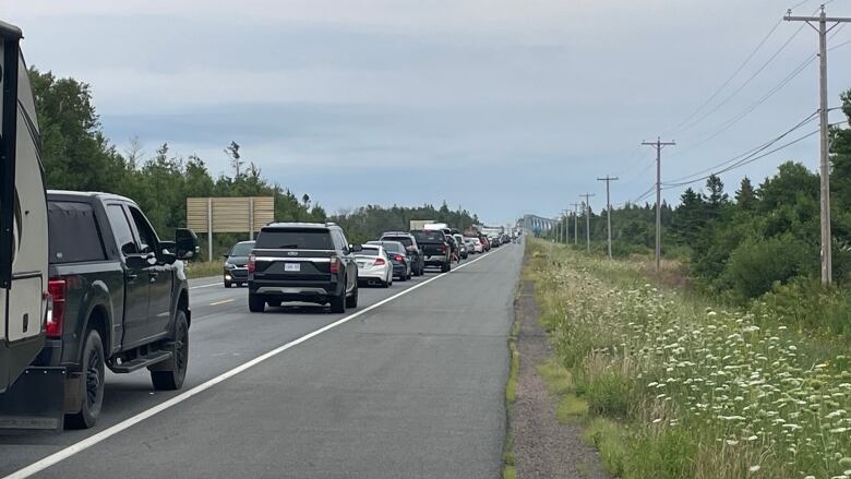 A long line of vehicles is pictured on the New Brunswick side of the Confederation Bridge. 