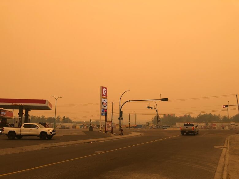 Smokey weather and a gas station. 