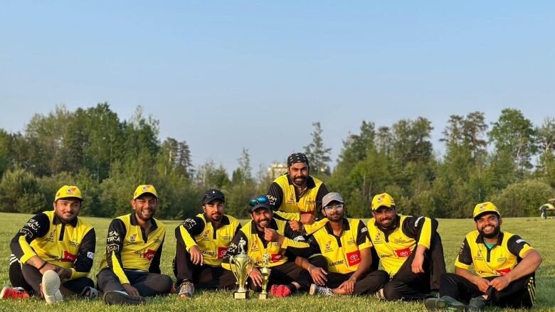 A team posing for a group photo.