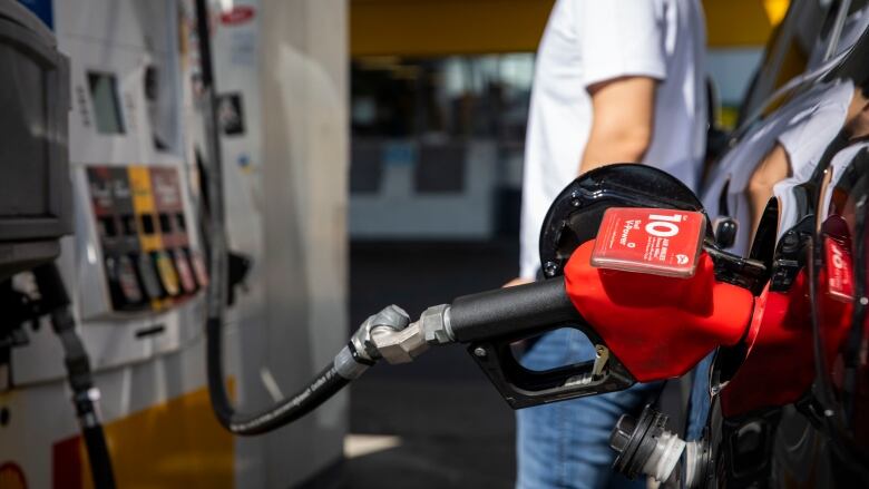 A gas station pump in Vancouver on a sunny day.