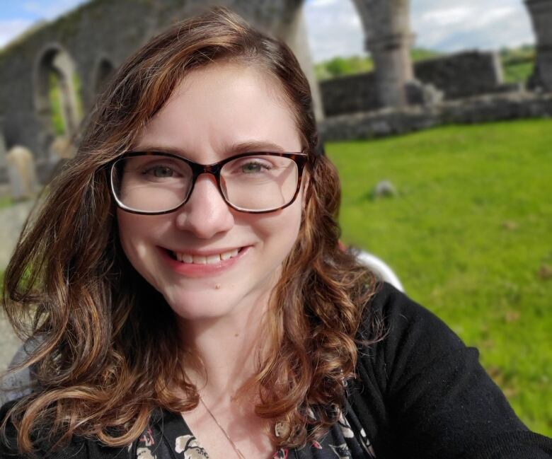 A selfie of a woman smiling. 