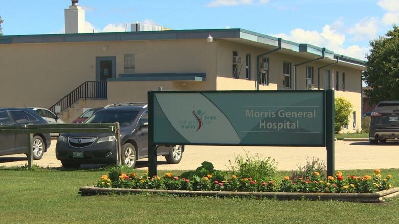 A sign outside a building reads 'Morris General Hospital.'