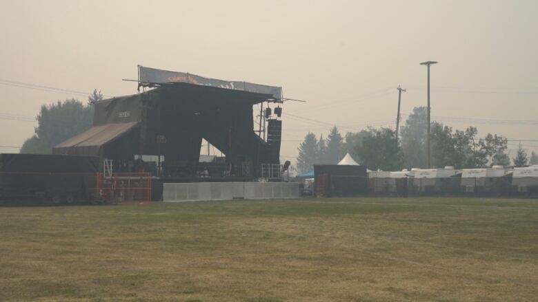 Empty smoky stage.