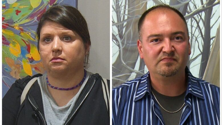 A woman wearing a black sweater standing next to a man wearing a blue shirt