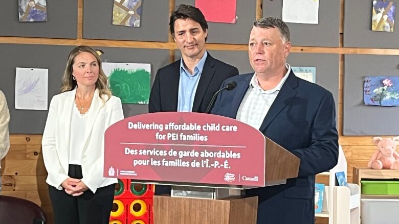 P.E.I. Premier Dennis Kings speaks at a news conference in Cornwall, P.E.I., along with Prime Minister Justin Trudeau and Jenna Sudds, the federal minister of families, children and social development.