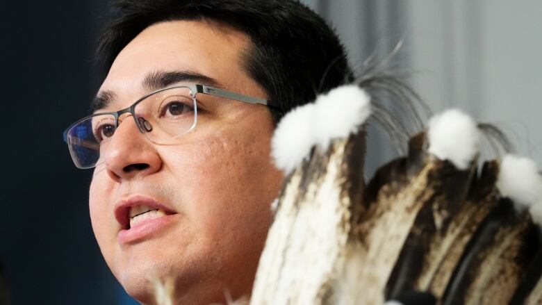 A First Nations chief speaks during a news conference.