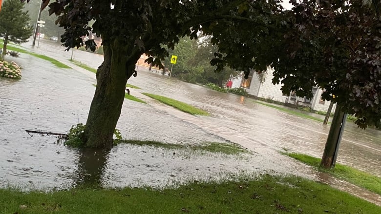 Streets were filled with water Thursday morning as a result of intense rainfall in Glencoe the night before. 