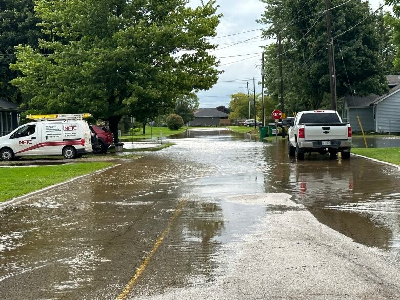 Many cars were struggling to drive on roads with such high water levels.