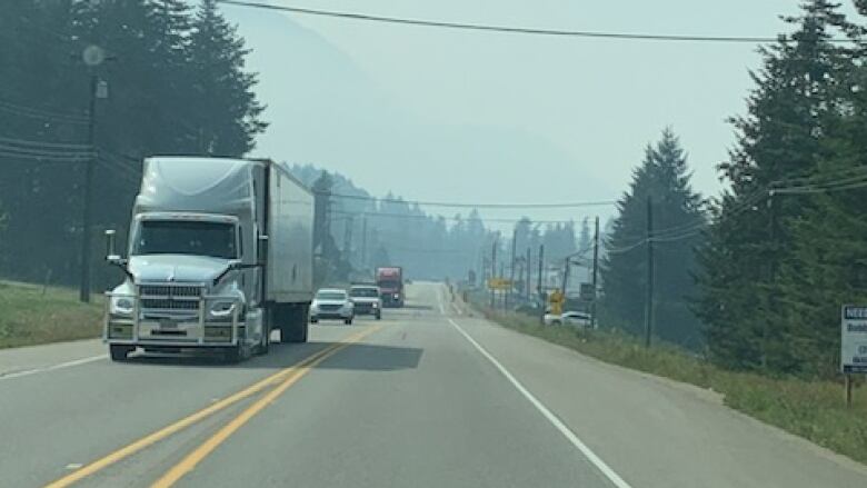 An oncoming truck on a highway