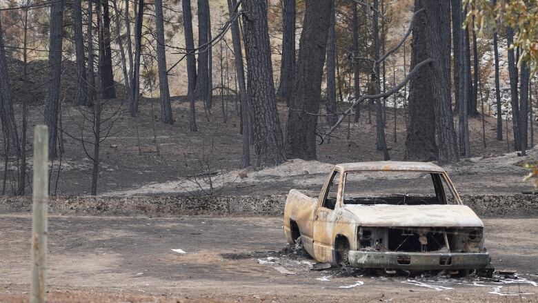 A charred truck.