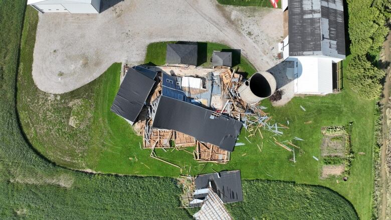 Aerial view of damage to a barn that collapsed after being hit by a tornado in Tecumseh, Ont., Aug. 24, 2023.