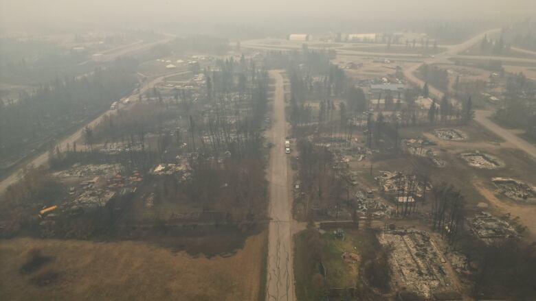 an aerial view of fire rubble