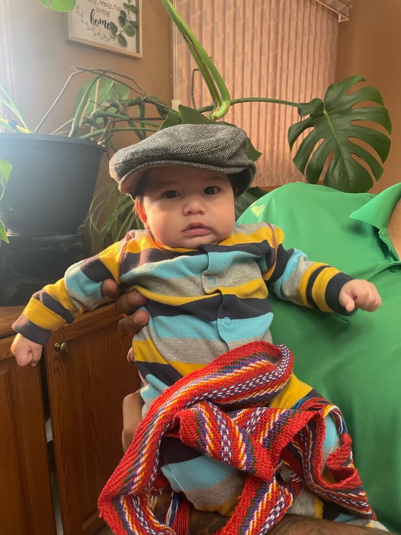 Born in June, Ronin wears his first Metis sash, given to him by his paternal grandparents