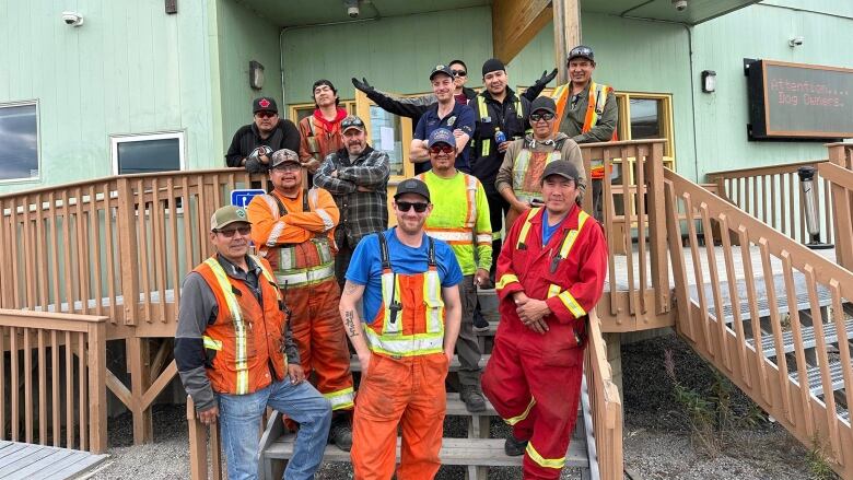 a group of people in high viz garb